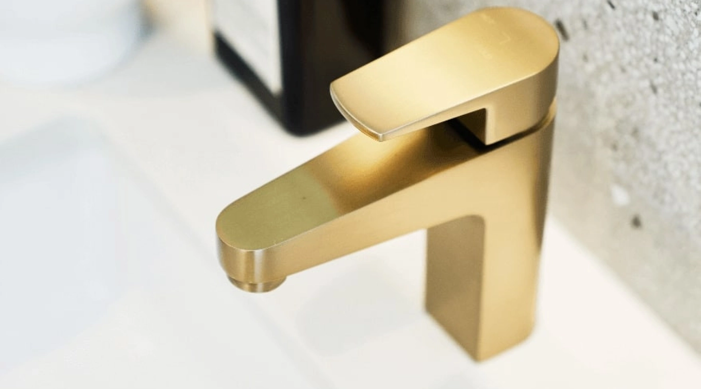 Close up photo of brass tapware in a Simonds Armidale 34 home design