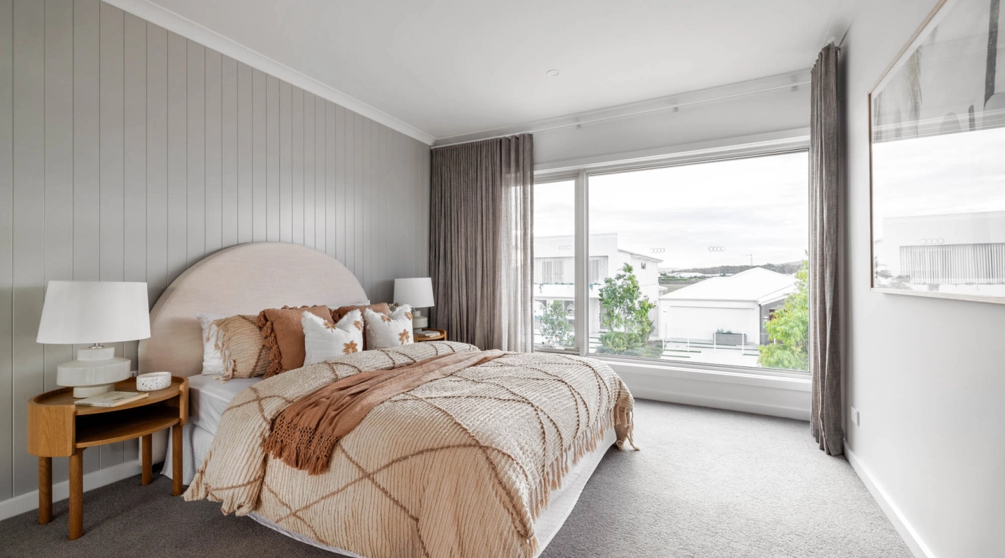 coastal-style interiors with wood cladding wall in a grey tone palette with a huge window for extra sunlight at travertine 31 bells creek